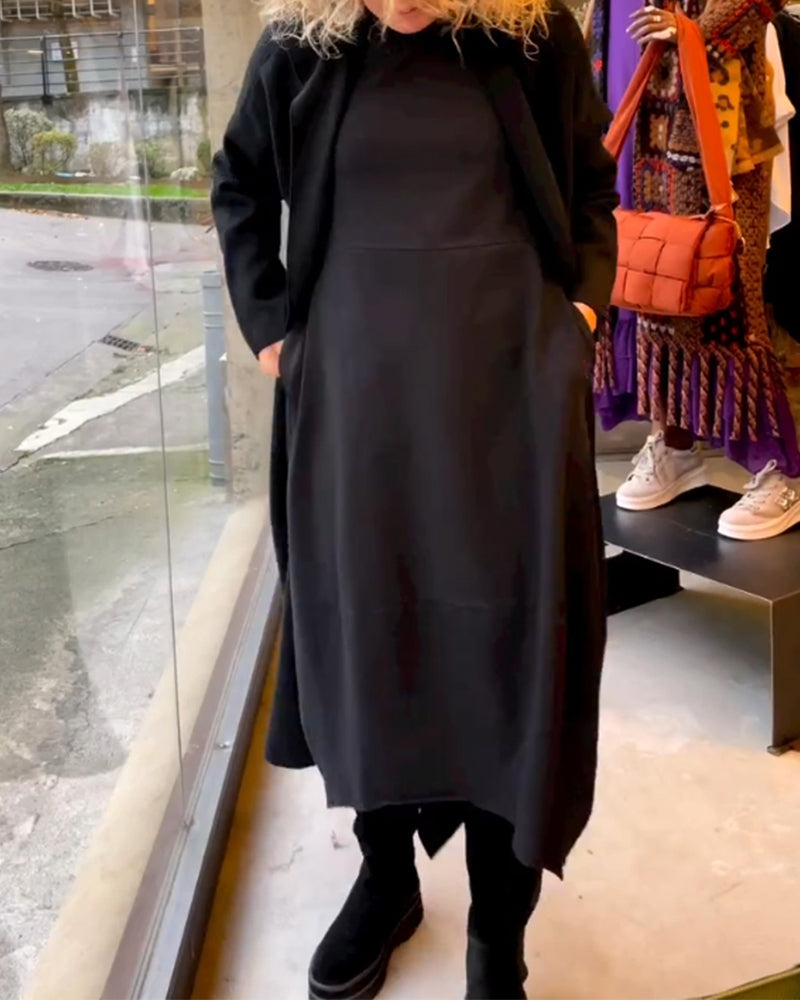 Coco - Vestido midi negro con bolsillos