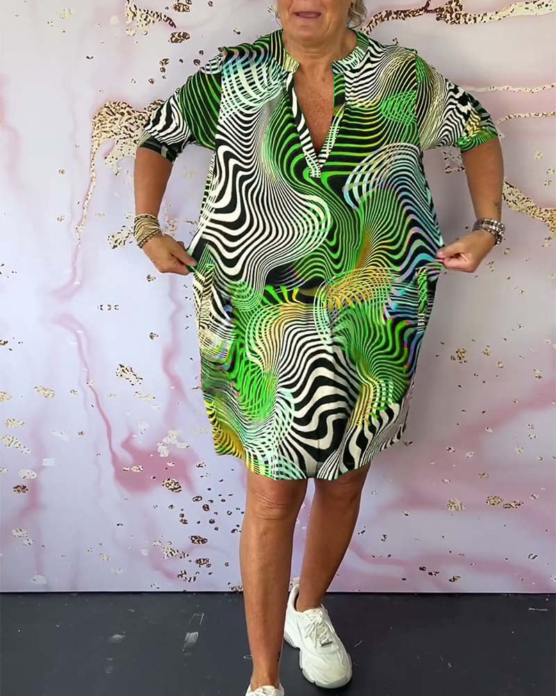 Ria - Vestido colorido con escote en V