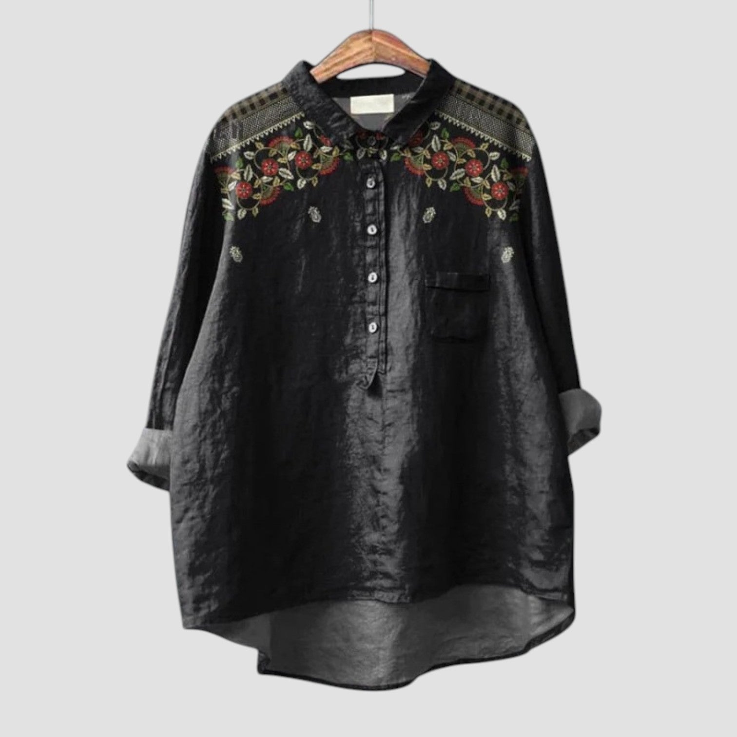 Carina ⏐ Blusa negra oversize con bordado floral para un estilo elegante y relajado